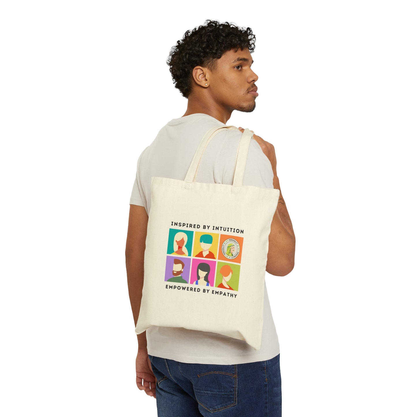 INFP Pride Cotton Canvas Tote Bag being carried, perfect for holding all your essentials during adventures or errands.